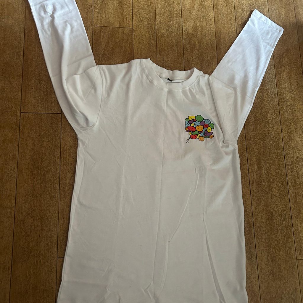 White long sleeve shirt with colorful felt design