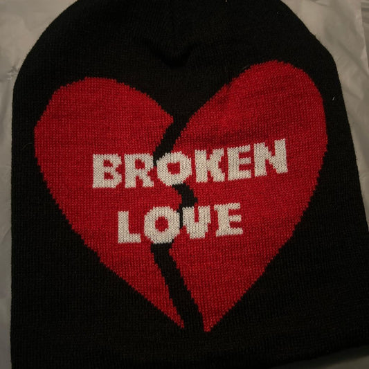 Black Broken Love beanie with red heart design
