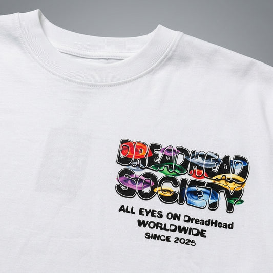 Dreadhead Society Eyes On Us White Graphic Tee Detail Close-Up of Neck Collar and Chest Logo
